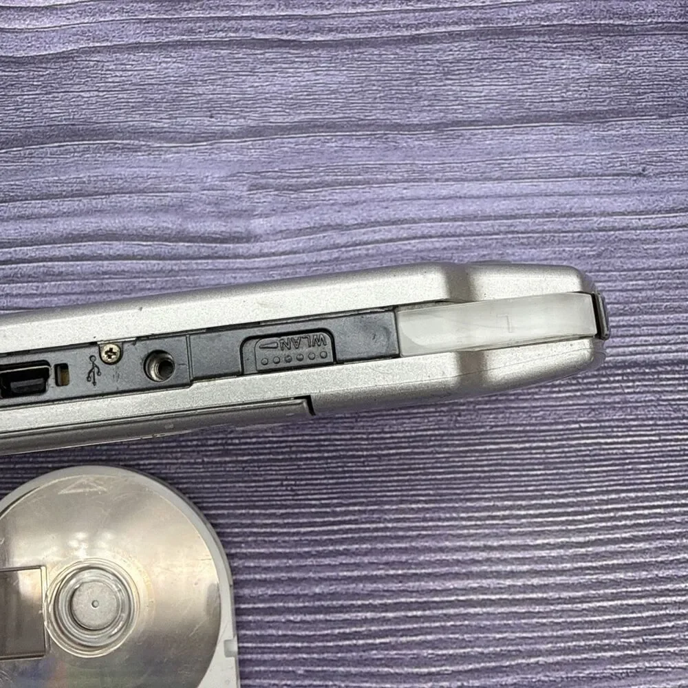 Sony PSP-2001 Slim Console - Silver - FOR PARTS OR REPAIR - UNTESTED- SEE PHOTOS